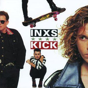 Vinyl record with 'INXS Kick' cover featuring band members and a skateboarder.