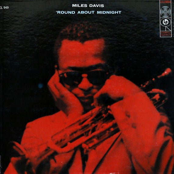 Album cover of 'Round About Midnight by Miles Davis with a red and black color scheme.