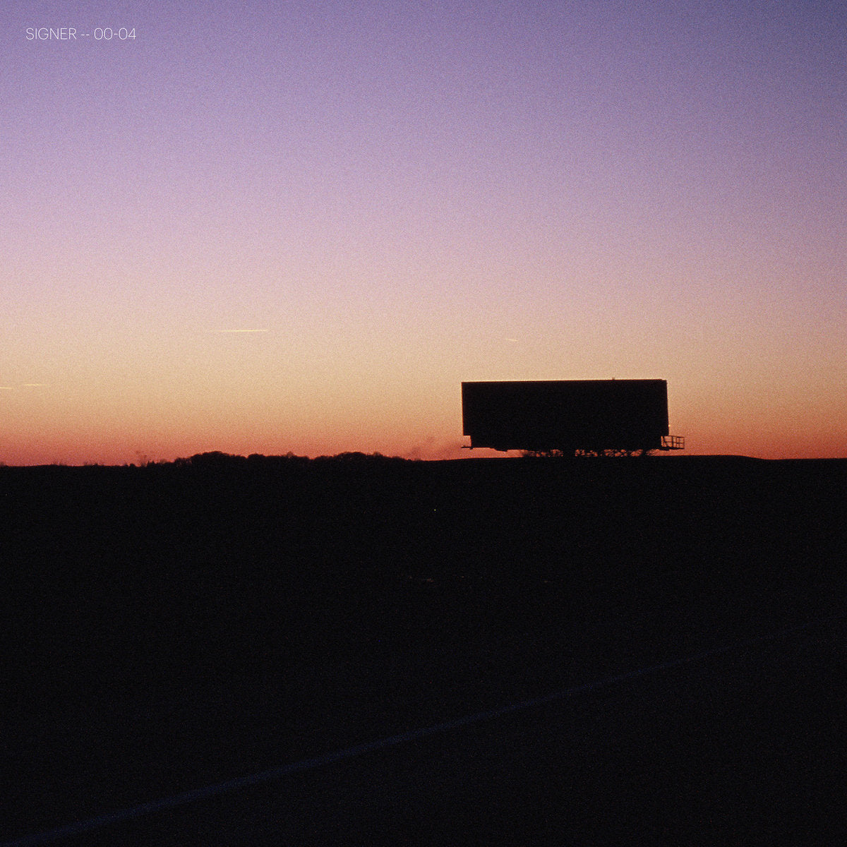 Truck on a road at sunset with a gradient sky