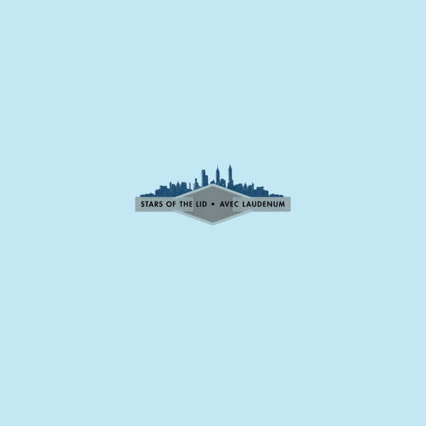 Album cover with city skyline silhouette and text on a light blue background