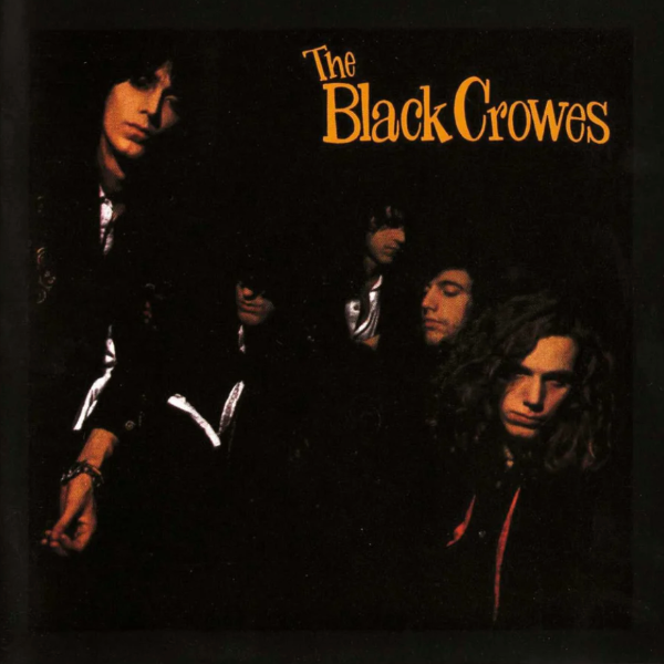 Album cover of 'The Black Crowes' with band members in dark clothing.