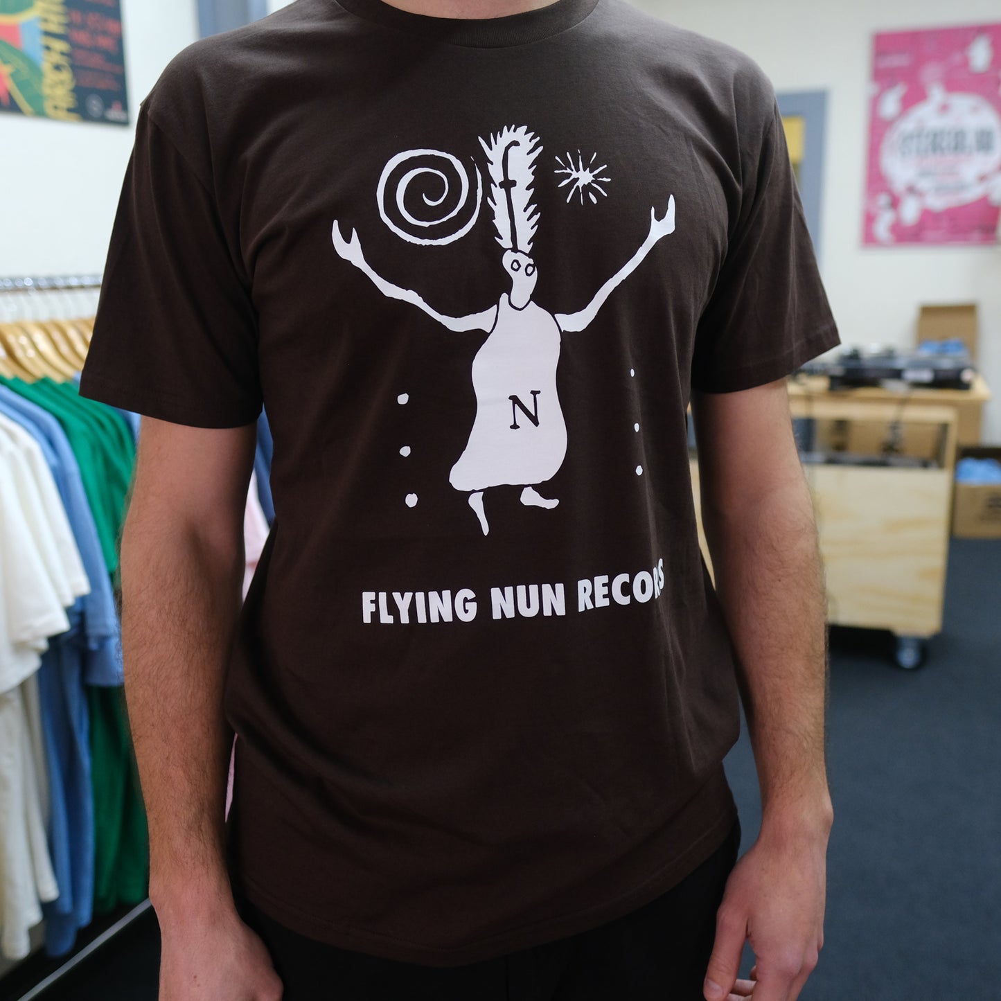 
                  
                    Fuzzy Flying Nun T-Shirt (Chocolate Brown)
                  
                